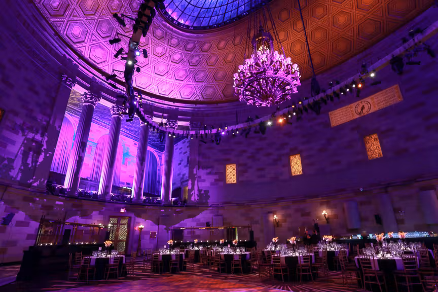 Professional corporate event theme with branded stage design and keynote speaker setup