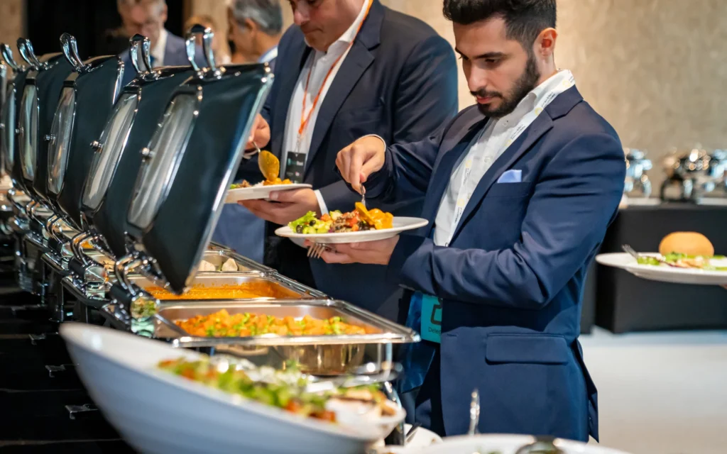 Professional catering service at a corporate event cost by marcem event