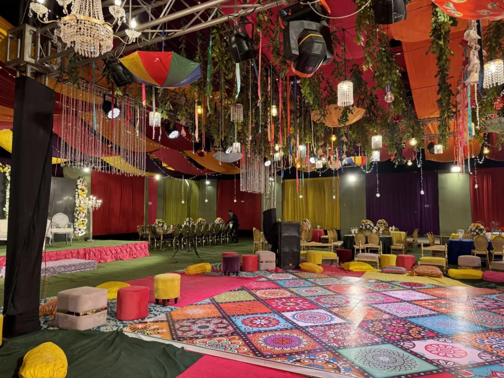 Beautiful Mehndi Stage Decoration with Floral Backdrop